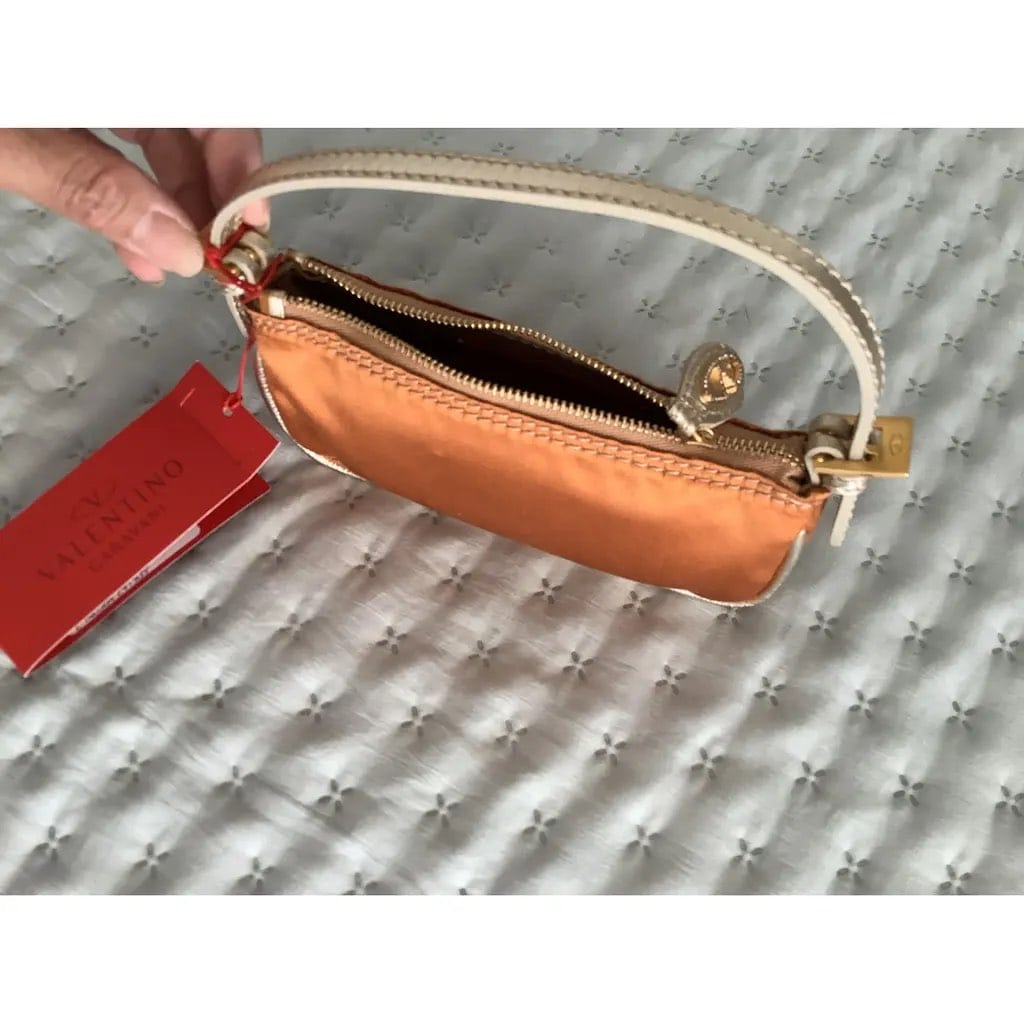 sc:https://old.stylecycle.gr/media/catalog/product/o/r/orange-silk-valentino-garavani-handbag-35201572-4_2.jpg-2.jpg